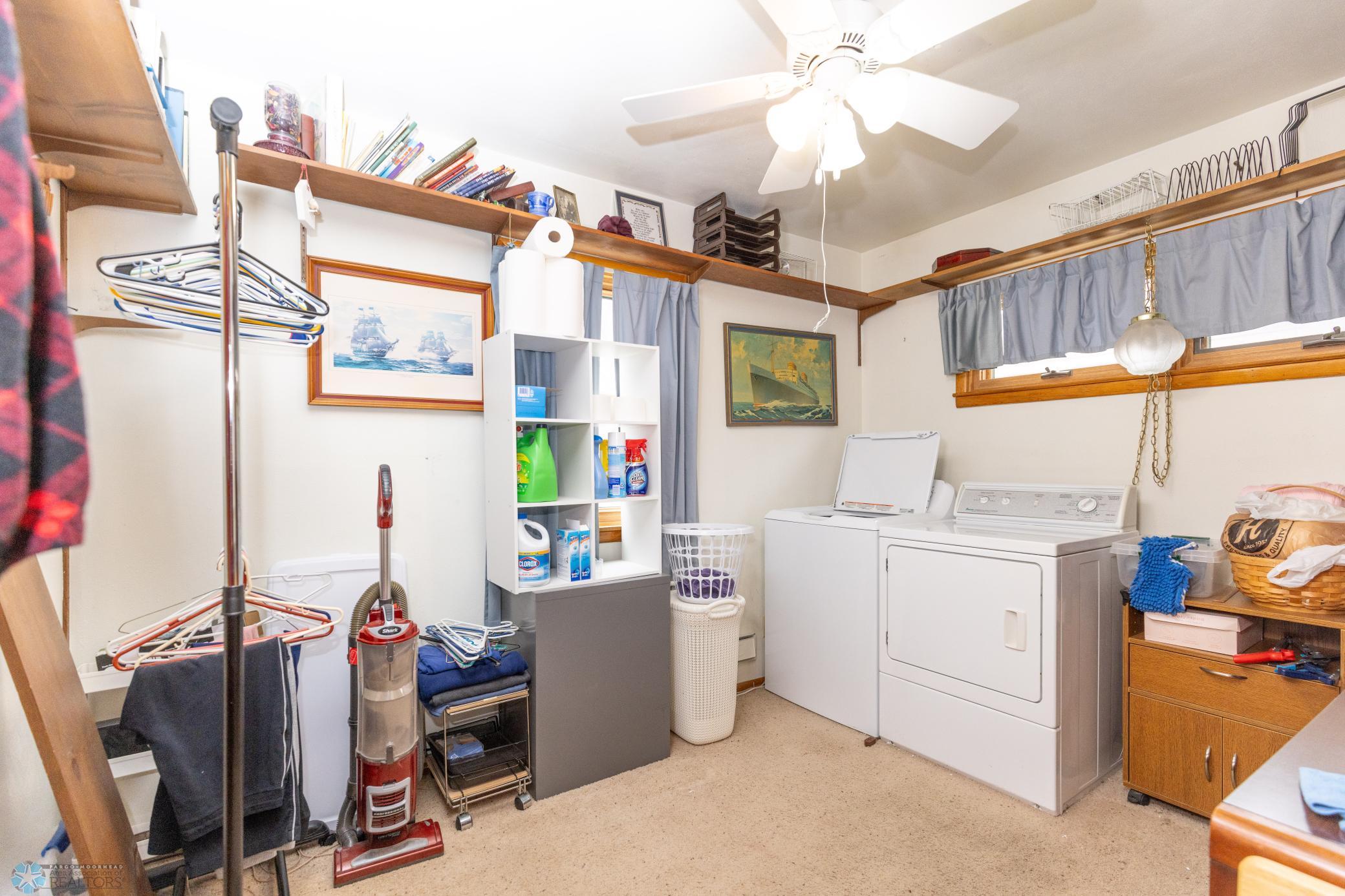 2nd Bedroom - Wood floors under the carpet. Washer and Dryer included and will be moved to the basement.