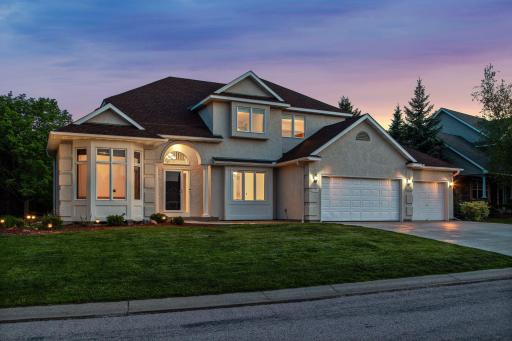 Former model home in the Wilds is on a private corner lot.