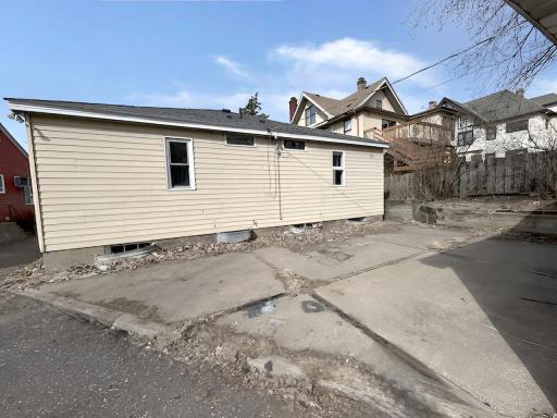 Rear of property with patio for grilling or sitting
