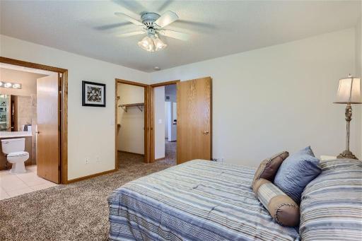 The ceiling fan provides added comfort for the room
