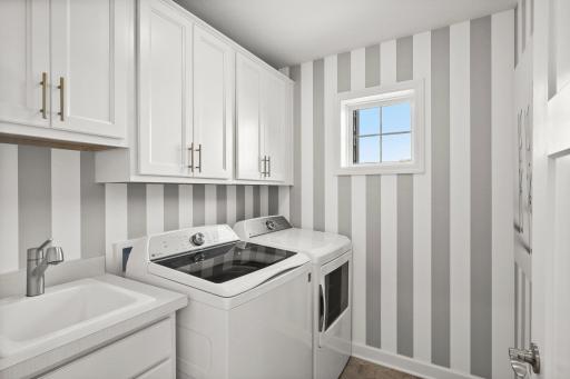 Laundry Room *Photo of a model home. Inquire about options with New Home Consultant.