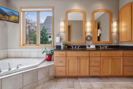 Jetted tub and Cambria quartz countertops