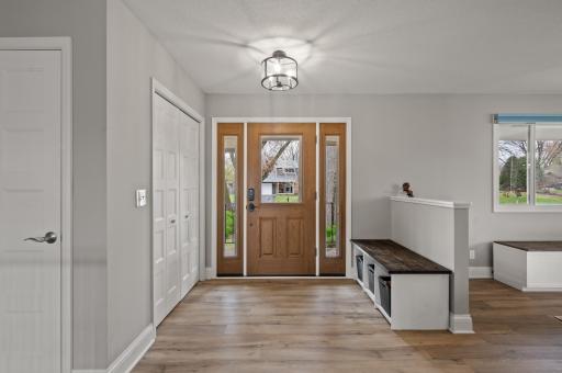 A spacious and inviting entry to greet guests and easily deposit coats.