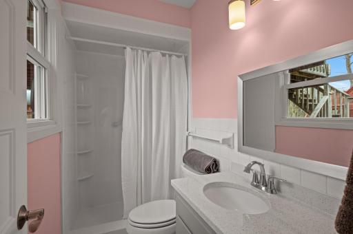 A 3/4 bathroom is convenient to the bedrooms.