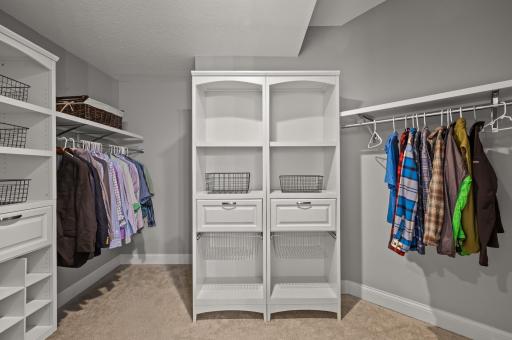 The owner's suite offers a large walk-in closet with custom storage.
