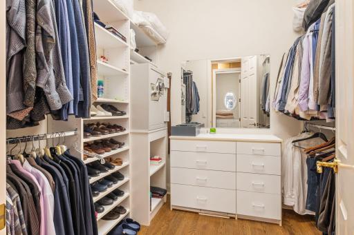 Custom designed closet and storage in the primary suite.