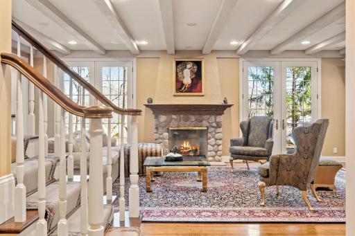 Cozy stone fireplace makes this room a great place to gather.