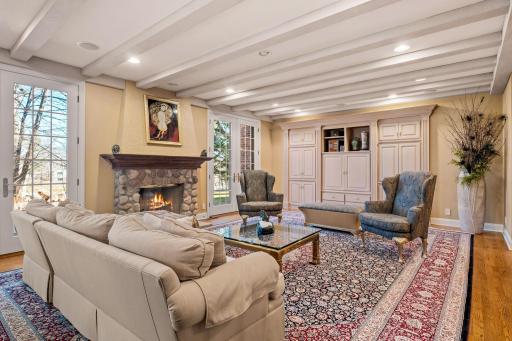 Lower level family room walks out to the paver patio spanning the back of the house.