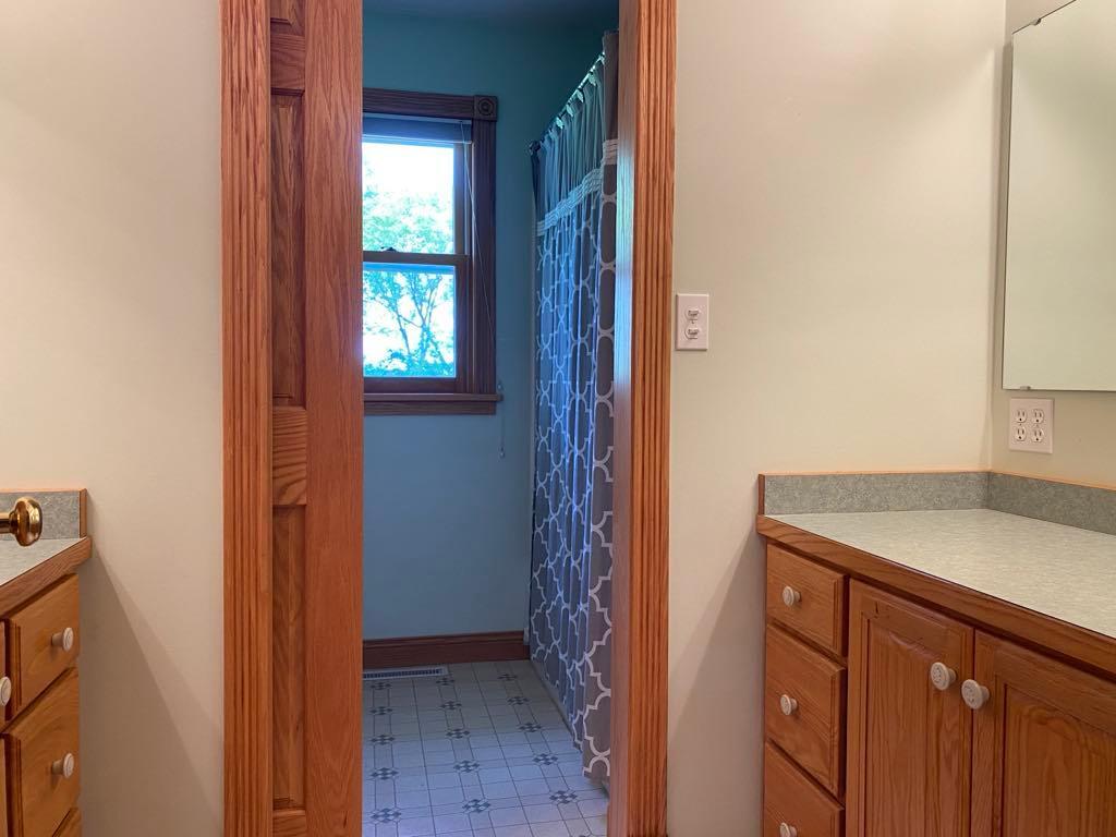 Upper Level Full Bath with Pocket Door