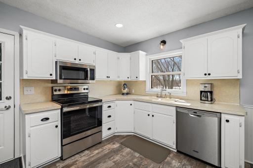 Smart improvements in this large kitchen area, appliances, recessed lighting, paint, and hardware. Southern exposure! Your kitchen window overlooks the back entire backyard. 8541 Kennedy Memorial Drive, Saint Bonifacius, MN 55375