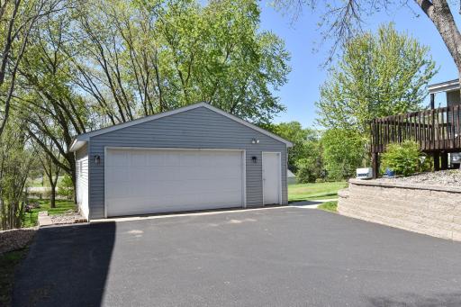 Driveway received a fresh seal coat in 2023. The garage is oversized at 24x24. 8541 Kennedy Memorial Drive, Saint Bonifacius, MN 55375