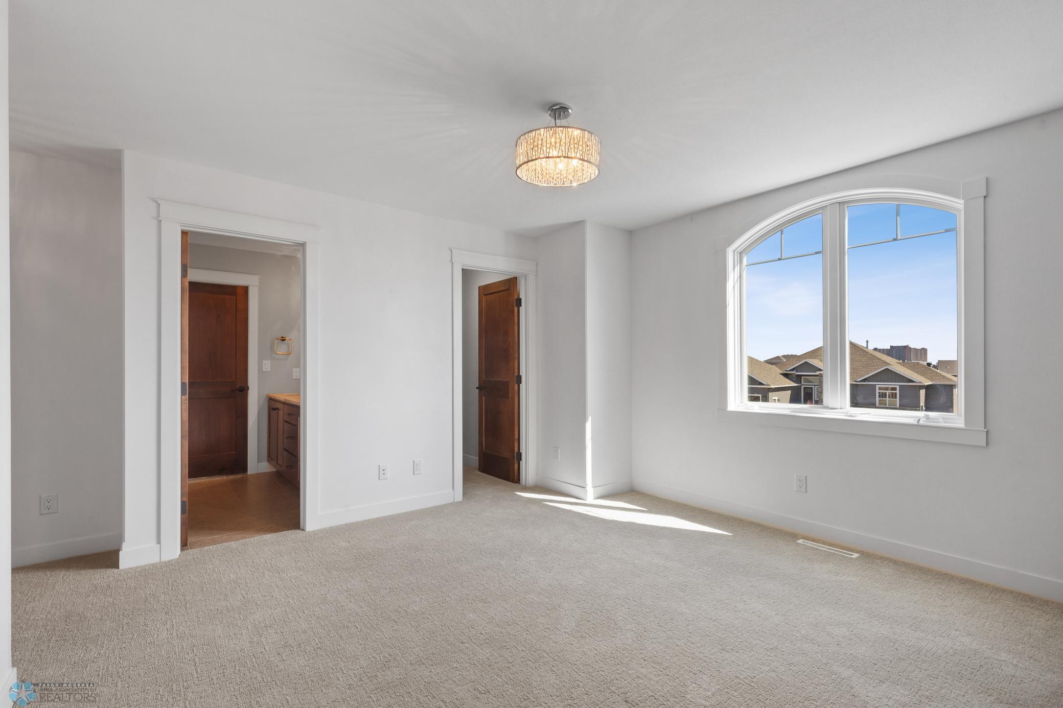bedroom 2 has walk-in closet and shared full bath