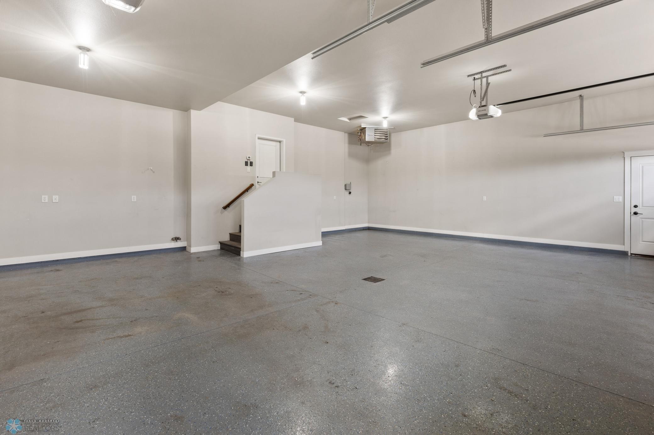 Finished garage: epoxy floor, heater, floor drain and hot/cold water