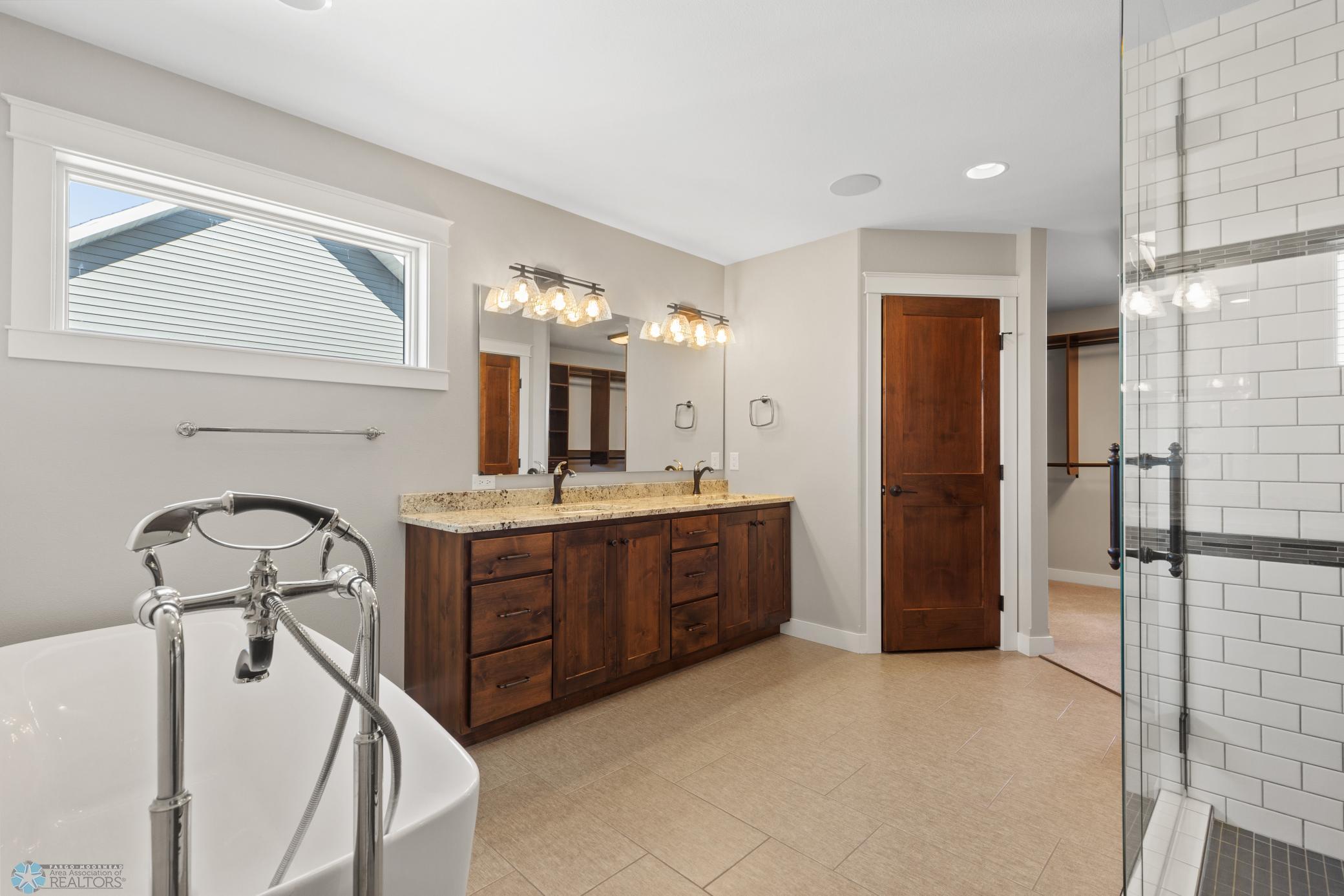 Primary bath soaking tub and double vanity