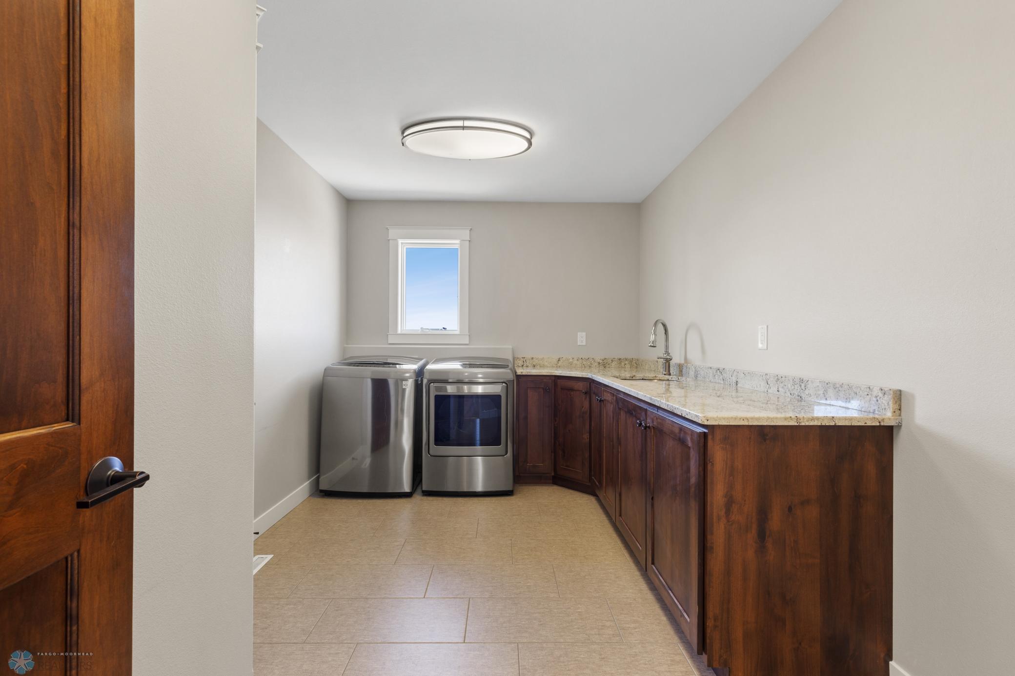 XL Laundry room. Walk-in closet not shown.