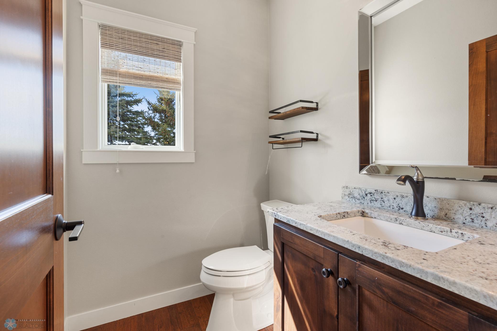 main floor half bath near flex room