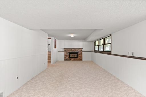 Spacious lower level with gas fireplace, 3/4 bath and 2 additional bedrooms!