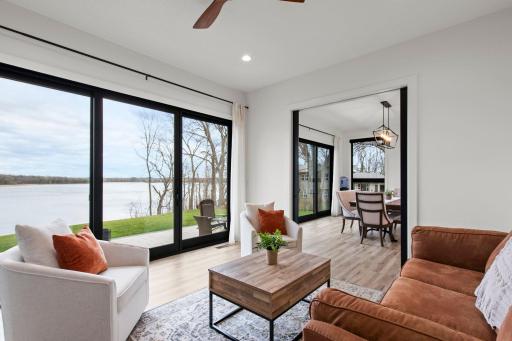 Windows continue, as well as seamless flooring throughout