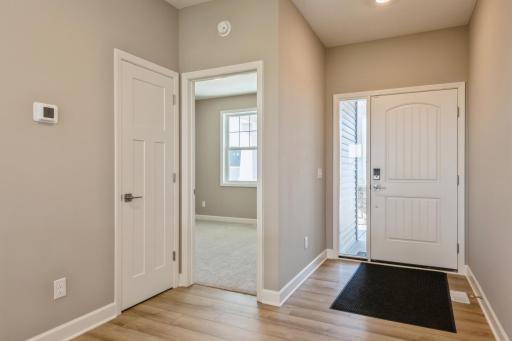 (*Photo of similar home, actual homes colors and finishes will vary) There is a spacious secondary bedroom located at the front of the home!