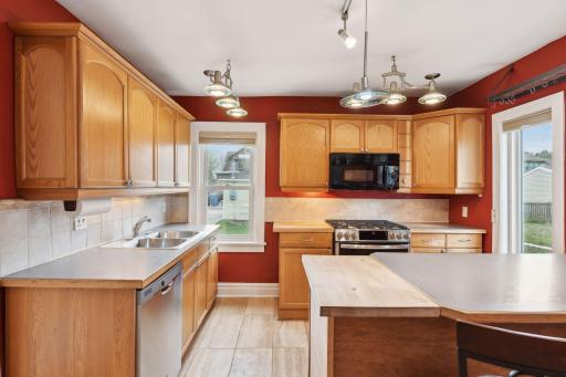 Bright & Open w/ Plenty of Cabinetry & Countertop Space, w/a Built-in Microwave w/ Outdoor Venting.