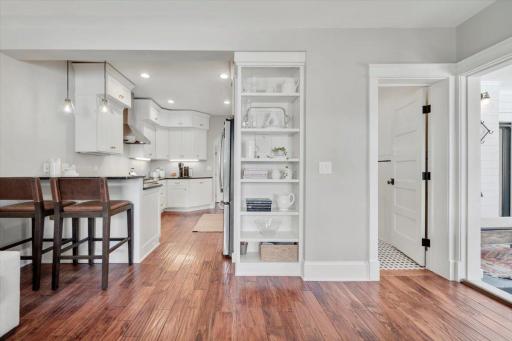 Main floor family / morning room overlooks breakfast bar and updated kitchen