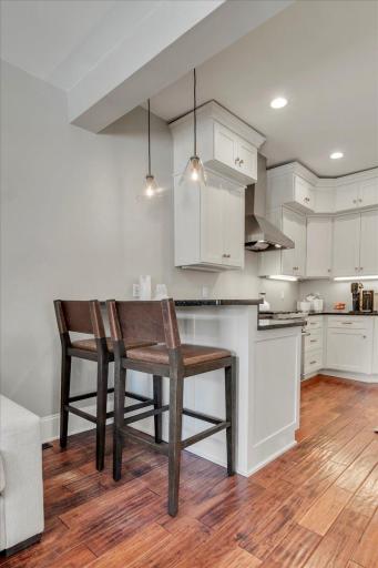 Breakfast bar offers the perfect spot for morning coffee or informal dining