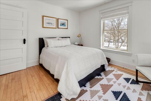 Second floor 2nd bedroom overlooking the front yard offering morning sunshine