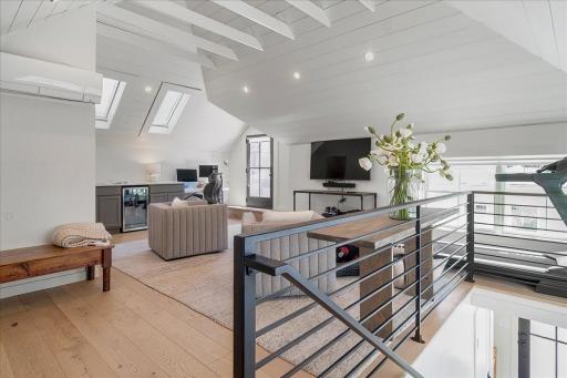 Bright and airy vaulted ceilings with beams and skylights
