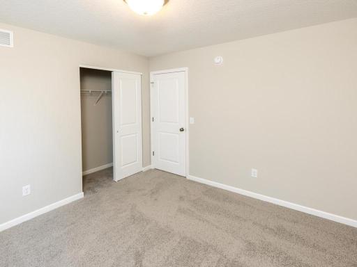 Photo taken of different home with similar plan & finishes. Bedroom 2.