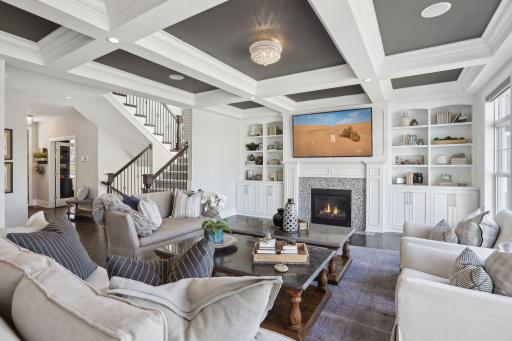 Hardwood floors, and wide stairs the lead to upper and lower levels