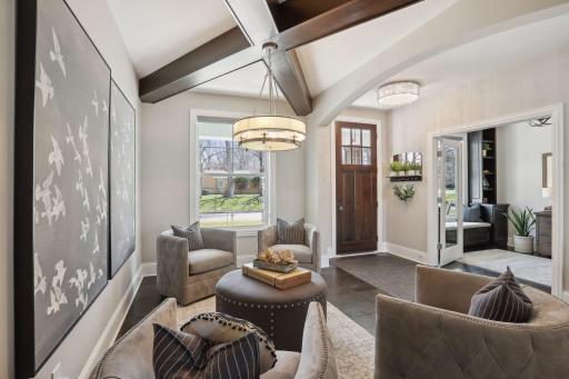 Gorgeous hardwood floors bring you full circle to the front entry