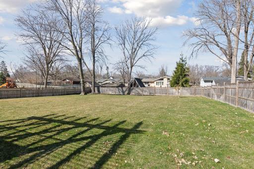Flat large back yard that is fully fenced with 2 gates for easy entry