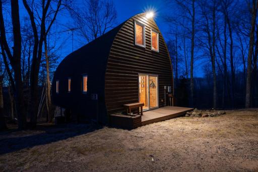 The guest cabin includes all of the amenities with a kitchen, bedroom loft and bathroom.
