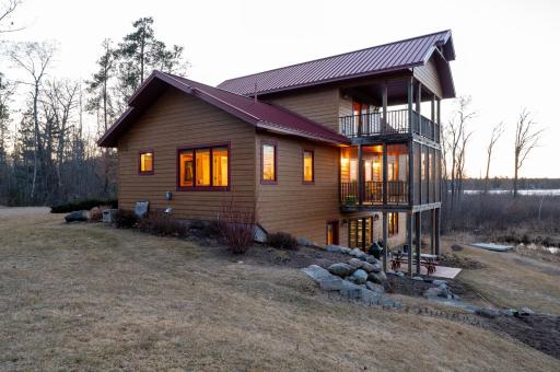 The main level screen porch offers outdoor comfort and and go to the upper deck for amazing lake views and sunsets.