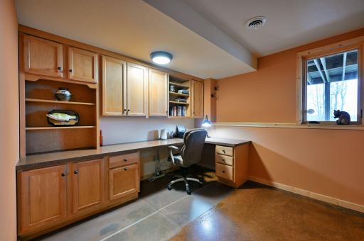 There an additional office space on this level with built-ins. There is a walk-in closet in the hall that could be paired with this room if you wanted to use it as an additional bedroom.