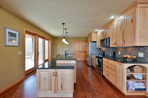 There is nice space between the island and the rest of the kitchen to accommodate several cooks!