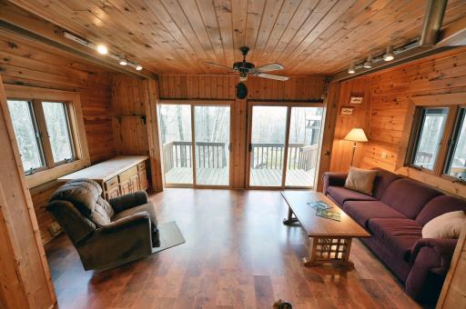 The guest house has charming plank walls and practical vinyl floors.