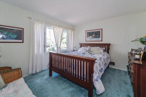 This bedroom in the upper level has Andersen windows (including a picture window!)