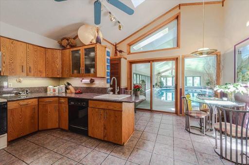 There is eat-in dining in the kitchen. The tile floor is functional when coming in from the pool.