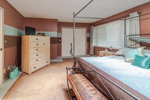 The primary bedroom has a closet, and there is also a walk-in closet in the bathroom.