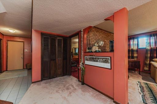 The lower level mud room measures 8x15 and has tile flooring.