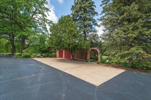 A brick archways welcomes you as you enter the lawn space.
