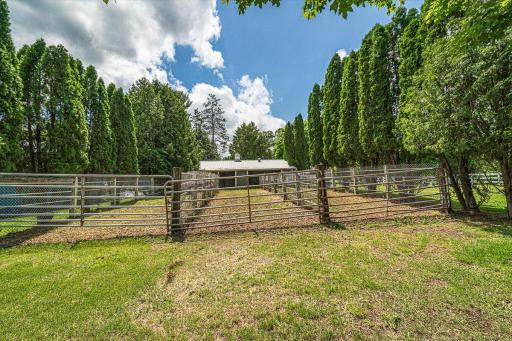 These three runs are are for horses or livestock, and are connected to the stallion barn.