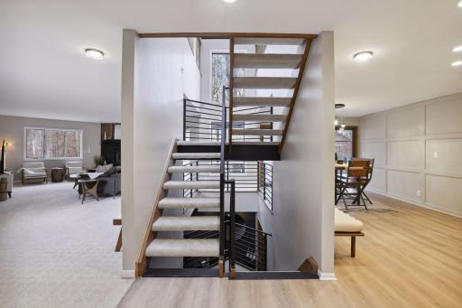 Custom railings continue throughout the interior.