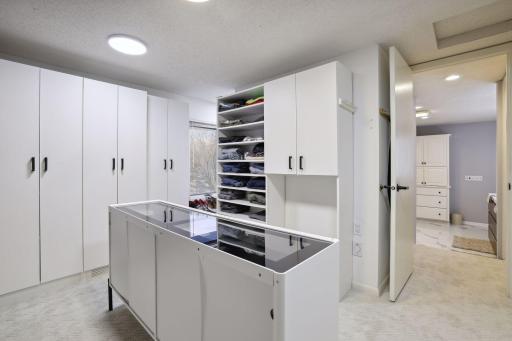 Largest of Primary bedroom walk in closet.