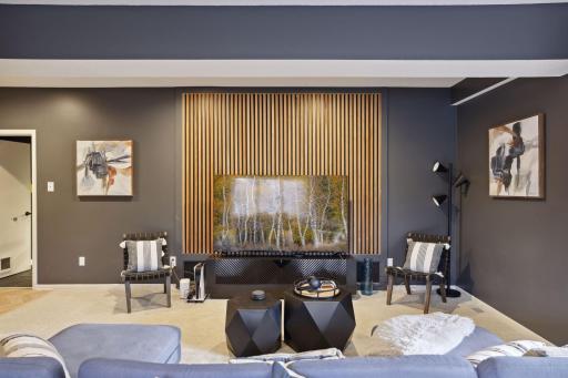 Feature slatwall in family room to match with slatwall in the living room.