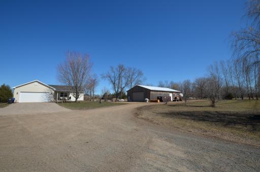 3 BR 2 BA rambler with huge 42x80 newer insulated heated pole barn and 27 acres