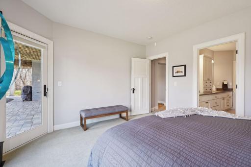 Lower-level bedroom with access to lower-level patio