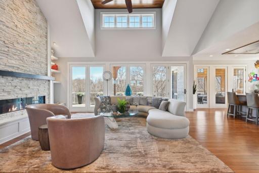 The wall full of windows gives expansive views of the open yard