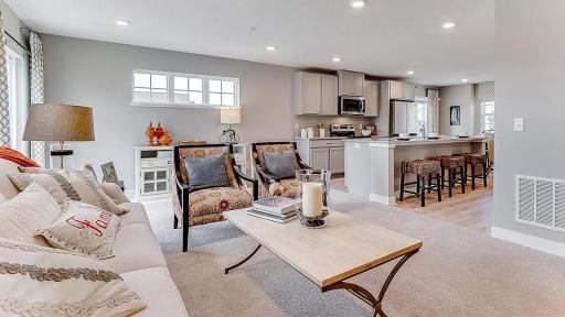 Another view of the large family room. Model picture shown. Colors and finishes may vary.